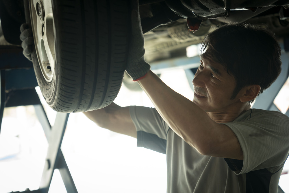 曾參加專業小型賽車賽及越野公路賽的李李仁,車子現在對他來說是全家人開心出遊回憶的地方。